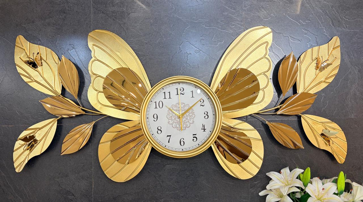 Luxury gold butterfly wall clock displayed in modern living room