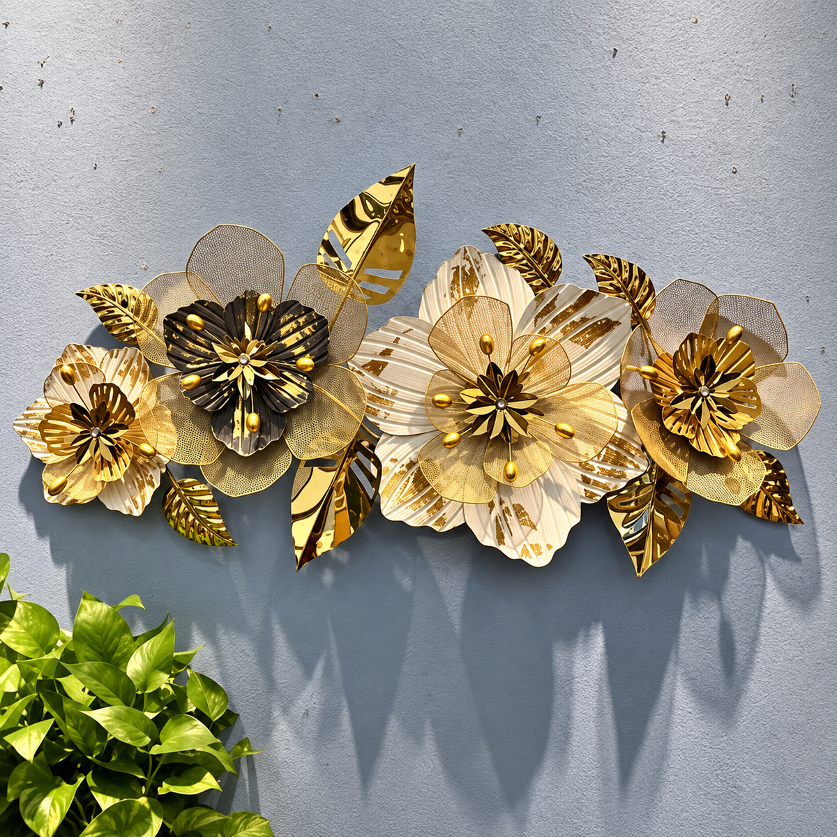 Gold floral metal wall art with cream and black 3D flowers